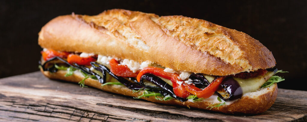 vegetarian,baguette,submarine,sandwich,with,grilled,eggplant,,pepper,and,feta
